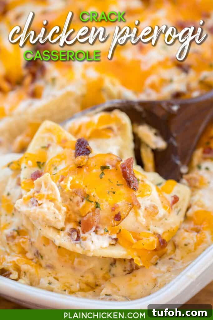 scooping pierogi casserole from baking dish