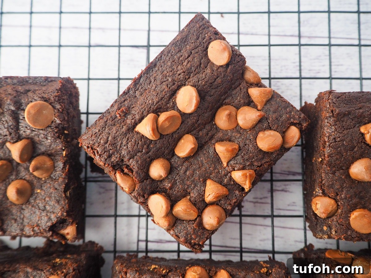 Decadent Egg-Free Brownies: Fudgy, Moist Recipe 2 Eggless brownies on a cooling rack