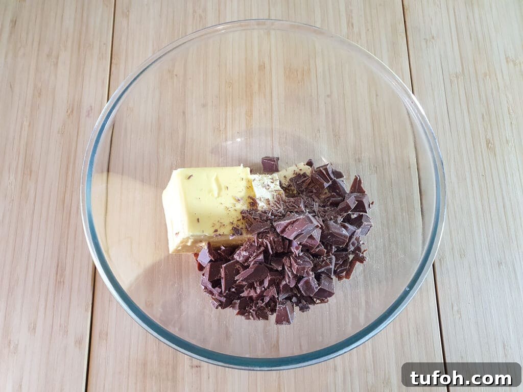 Decadent Egg-Free Brownies: Fudgy, Moist Recipe 7 Adding butter and chopped chocolate to a microwave proof bowl.