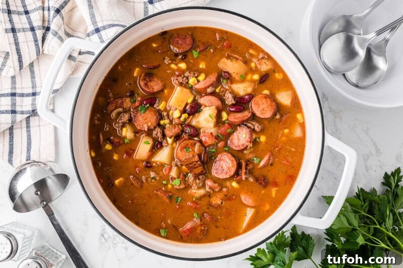Hearty Cowboy Stew Recipe: Classic Beef and Bean Dinner 4 top-down view of the Cowboy Stew in the pot.