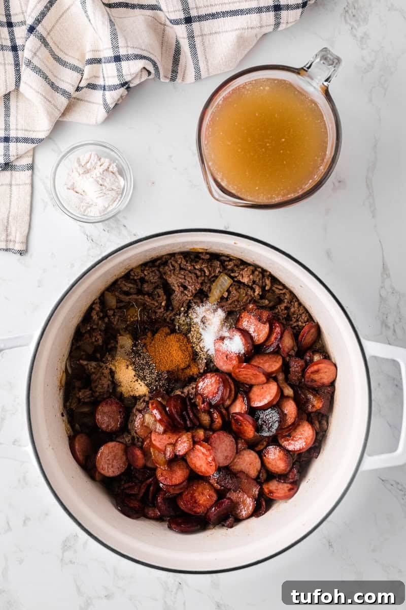 Hearty Cowboy Stew Recipe: Classic Beef and Bean Dinner 6 all the meat and seasoning in the pot.