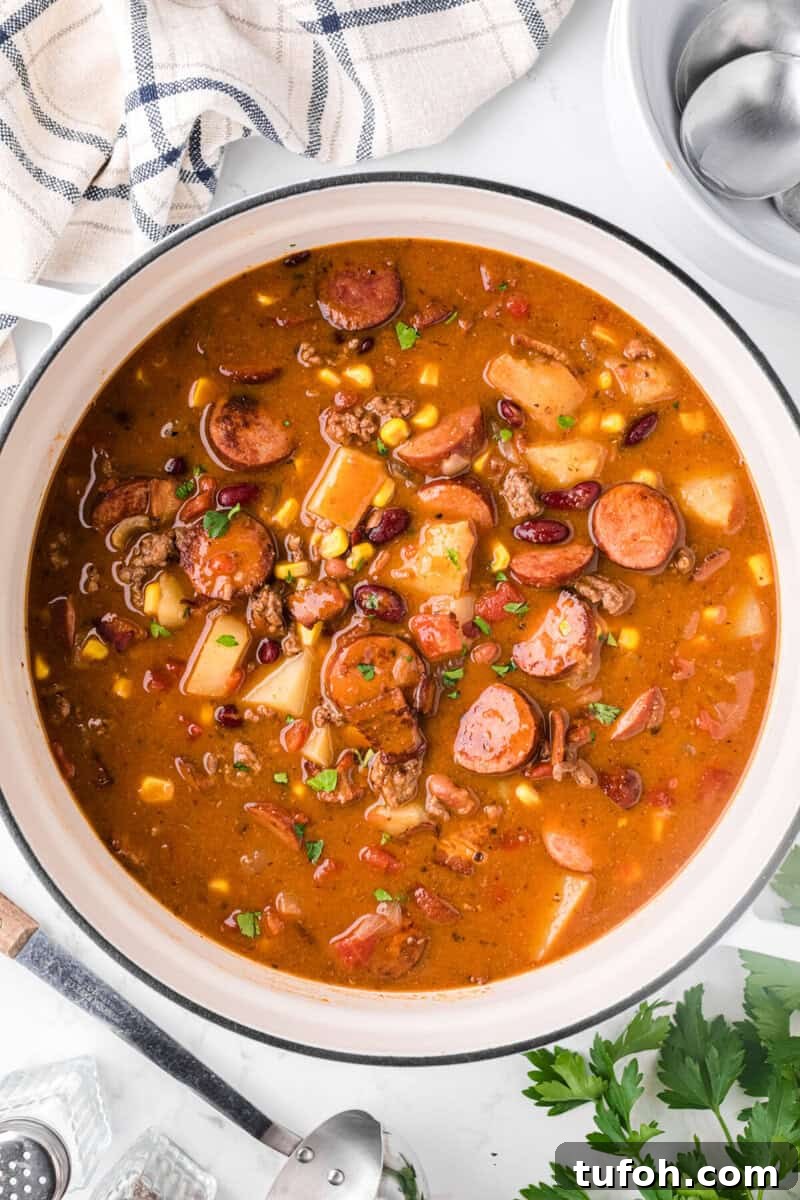 Hearty Cowboy Stew Recipe: Classic Beef and Bean Dinner 9 Cowboy Stew in the pot cooking.