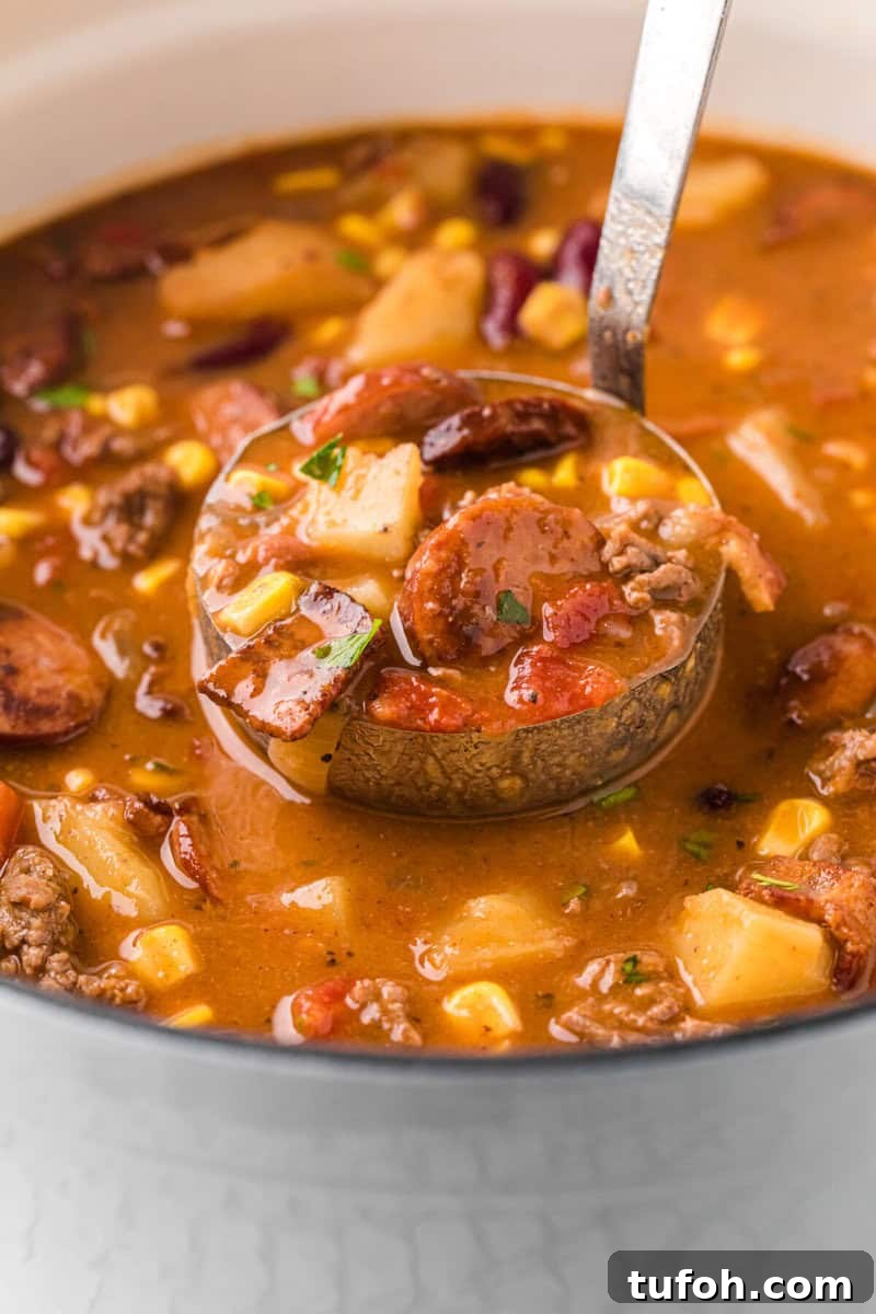 Hearty Cowboy Stew Recipe: Classic Beef and Bean Dinner 10 serving the Cowboy Stew with a metal ladle.