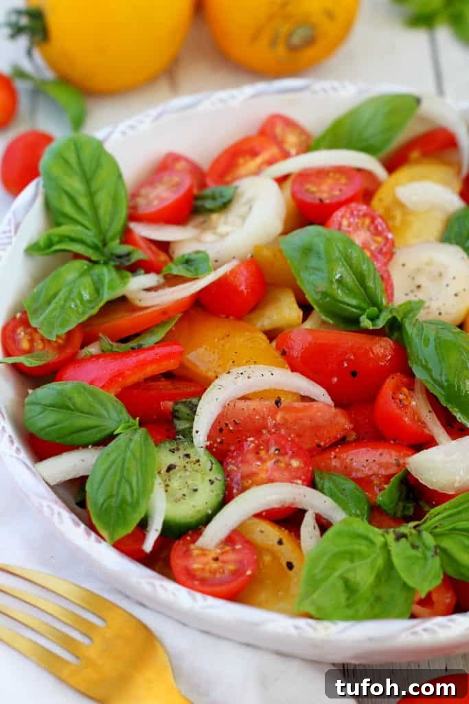 Crisp Tomato & Cucumber Salad with Lemon Vinaigrette 4 close op of cucumber and tomato salad