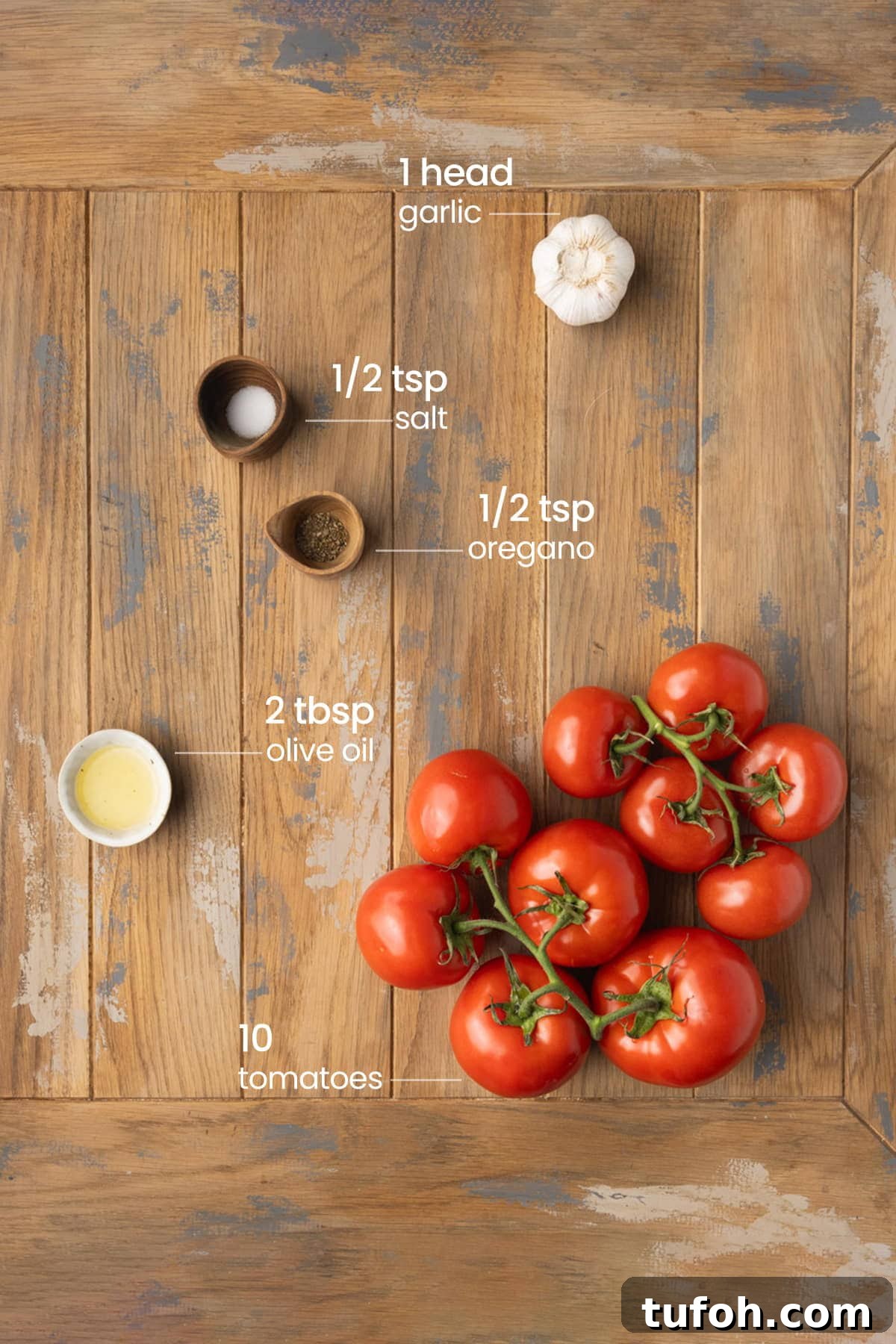 ingredients for homemade pizza sauce - garlic, salt, oregano, olive oil, tomatoes
