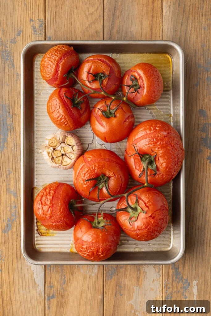 Roasted whole garlic and tomatoes fresh out of the oven.