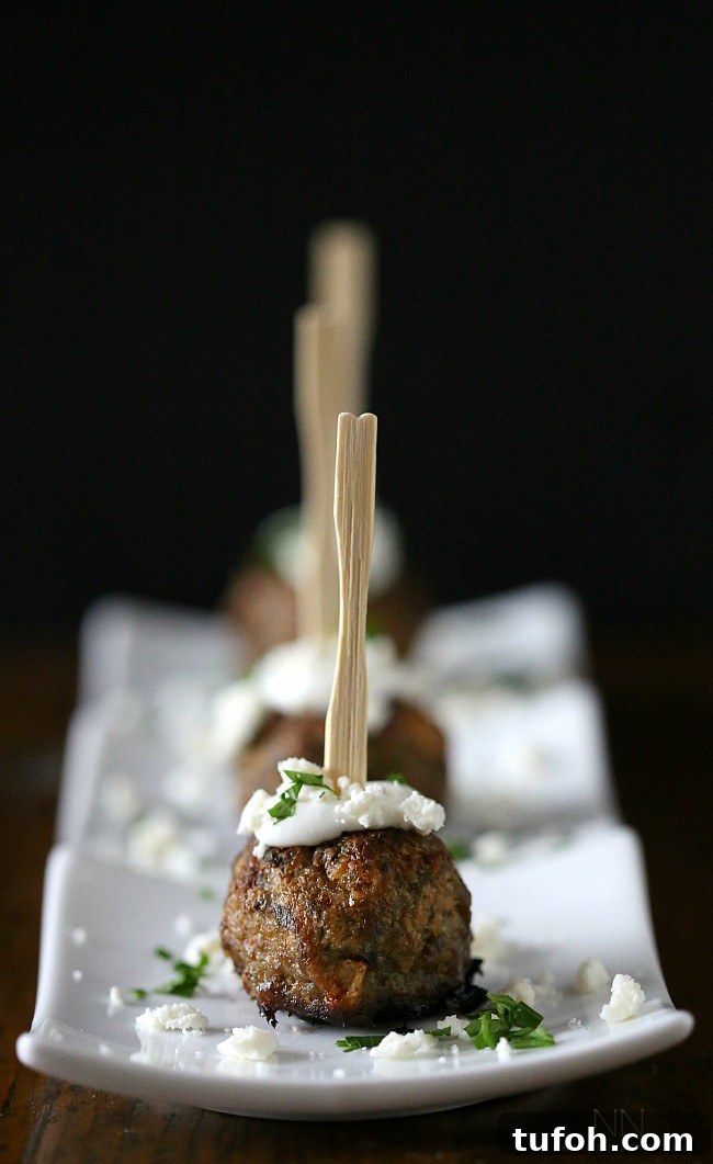 Greek Lamb Meatballs by Nutmeg Nanny Greek Lamb Meatballs on a platter.
