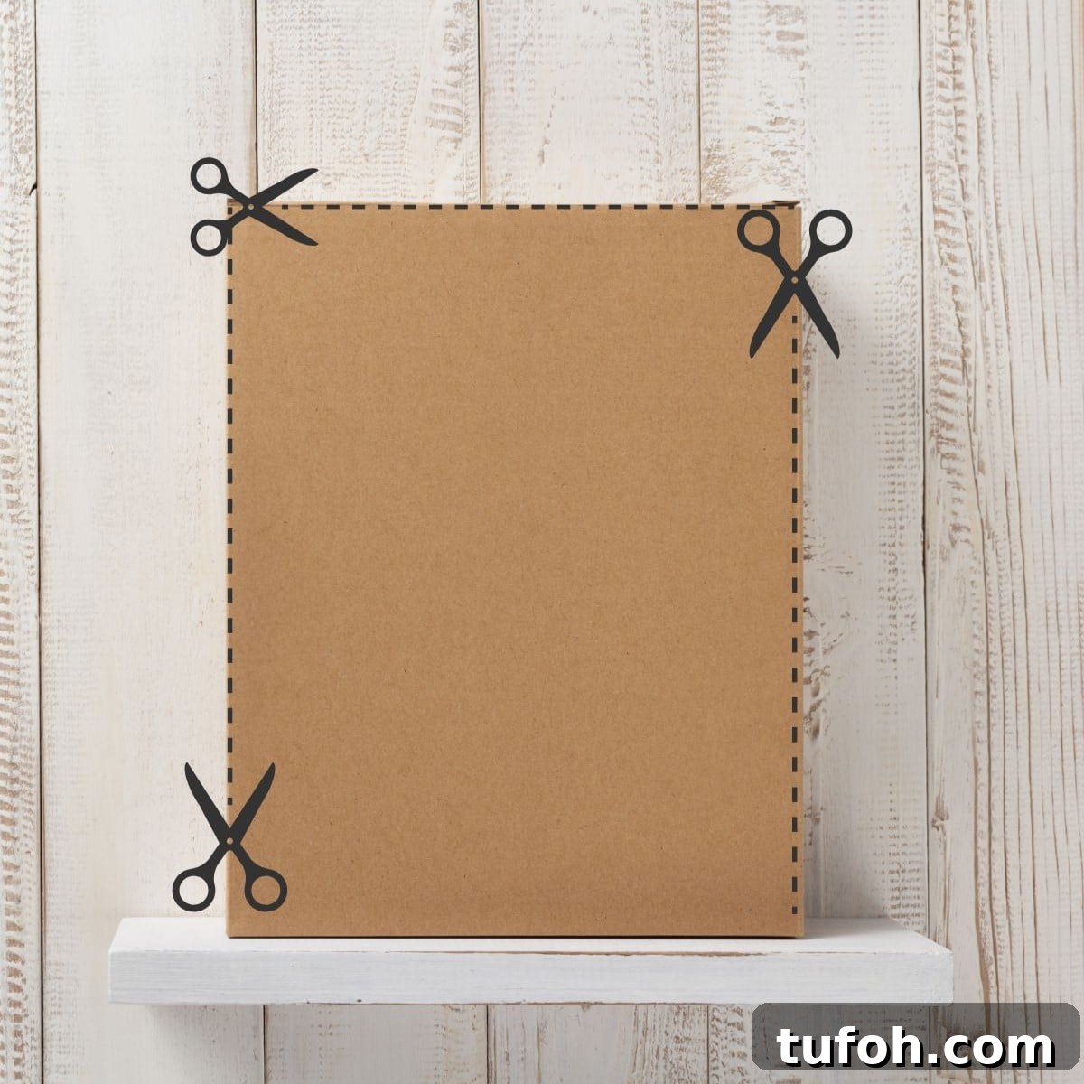 How to Safely Transport a Wedding Cake: 7 Proven Tips 5 A tall cardboard box with scissors lines showing to cut along the front sides to create a door to place a tiered wedding cake and easily transport it.