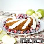 vegan cranberry apple bundt cake with cream cheese frosting | The Baking Fairy