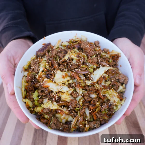 Beef egg roll bowl presented.