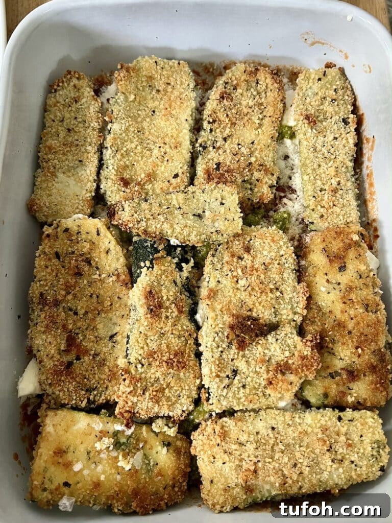 Zucchini Parmigiana with Ricotta: Layered Baked Zucchini Parmesan 11 Starting the layering process all over again with another layer of panko crusted Italian squash.