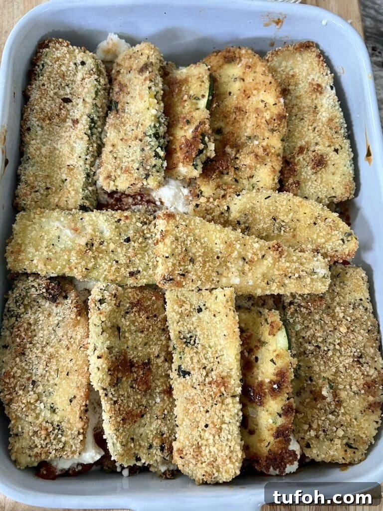 Zucchini Parmigiana with Ricotta: Layered Baked Zucchini Parmesan 14 Another layer of baked zucchini added.