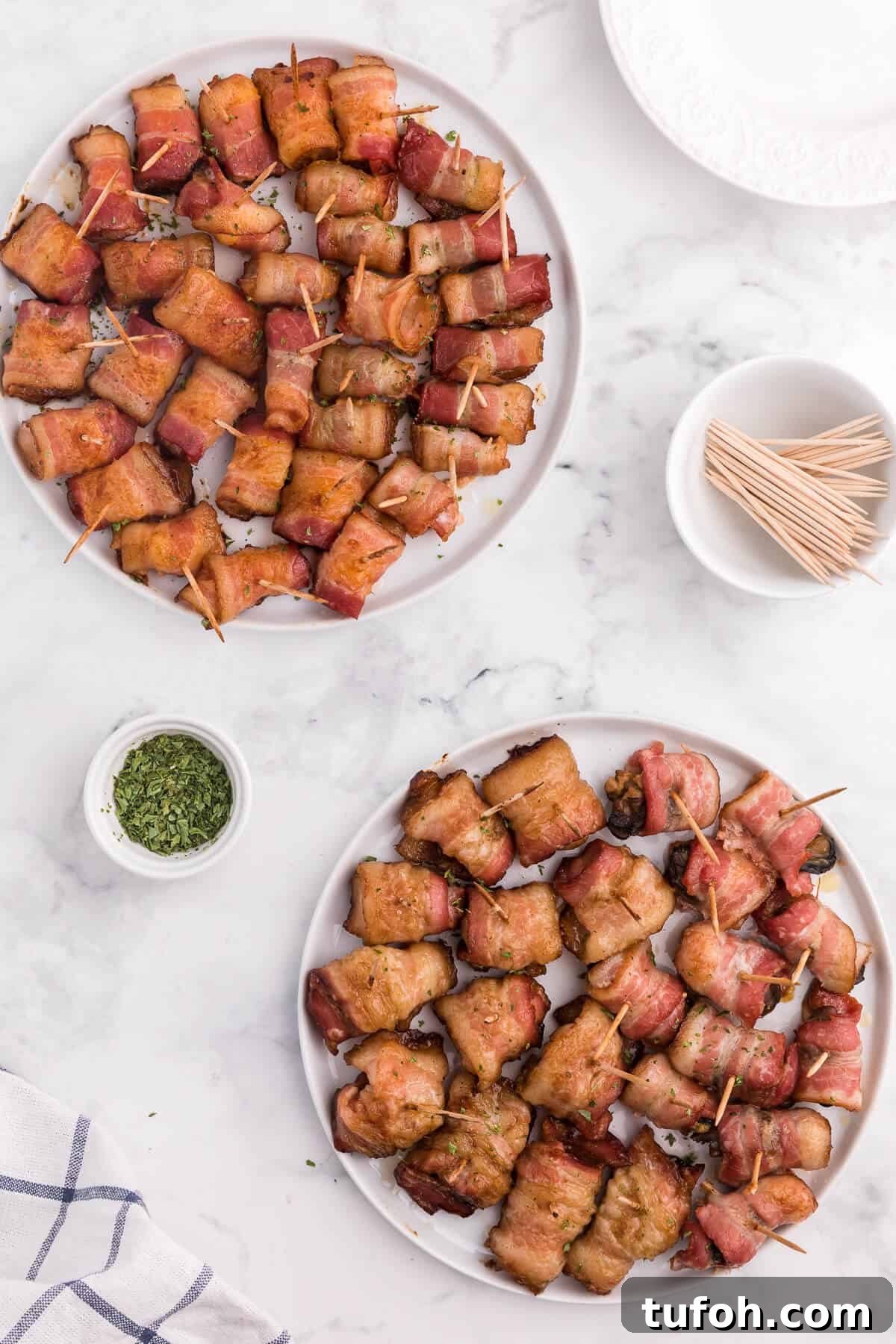 Bacon Wrapped Appetizers - Bite sized and addicting! Try four varieties - bacon wrapped water chestnuts, bacon wrapped smoked oysters, bacon wrapped pineapple and bacon wrapped olives.