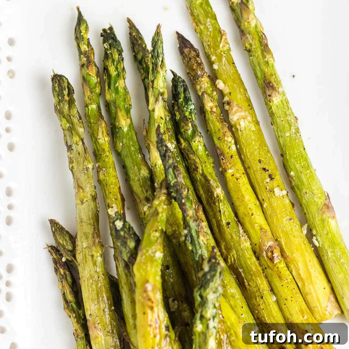 Crispy Oven-Roasted Asparagus with Garlic and Lemon 14 Closeup of roasted asparagus.