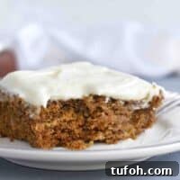 slice of gingerbread cake with bite out of it on plate