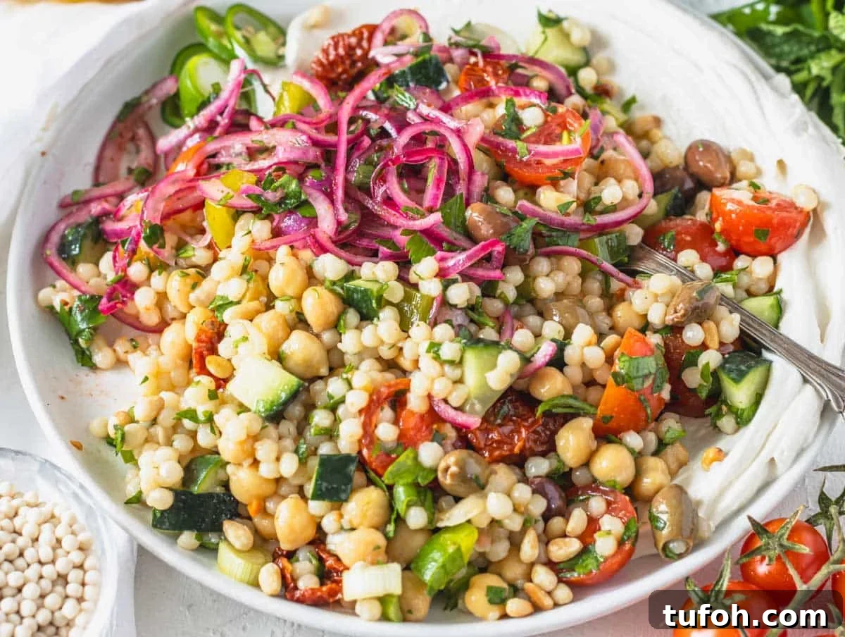 Israeli couscous with sumac onions and yogurt