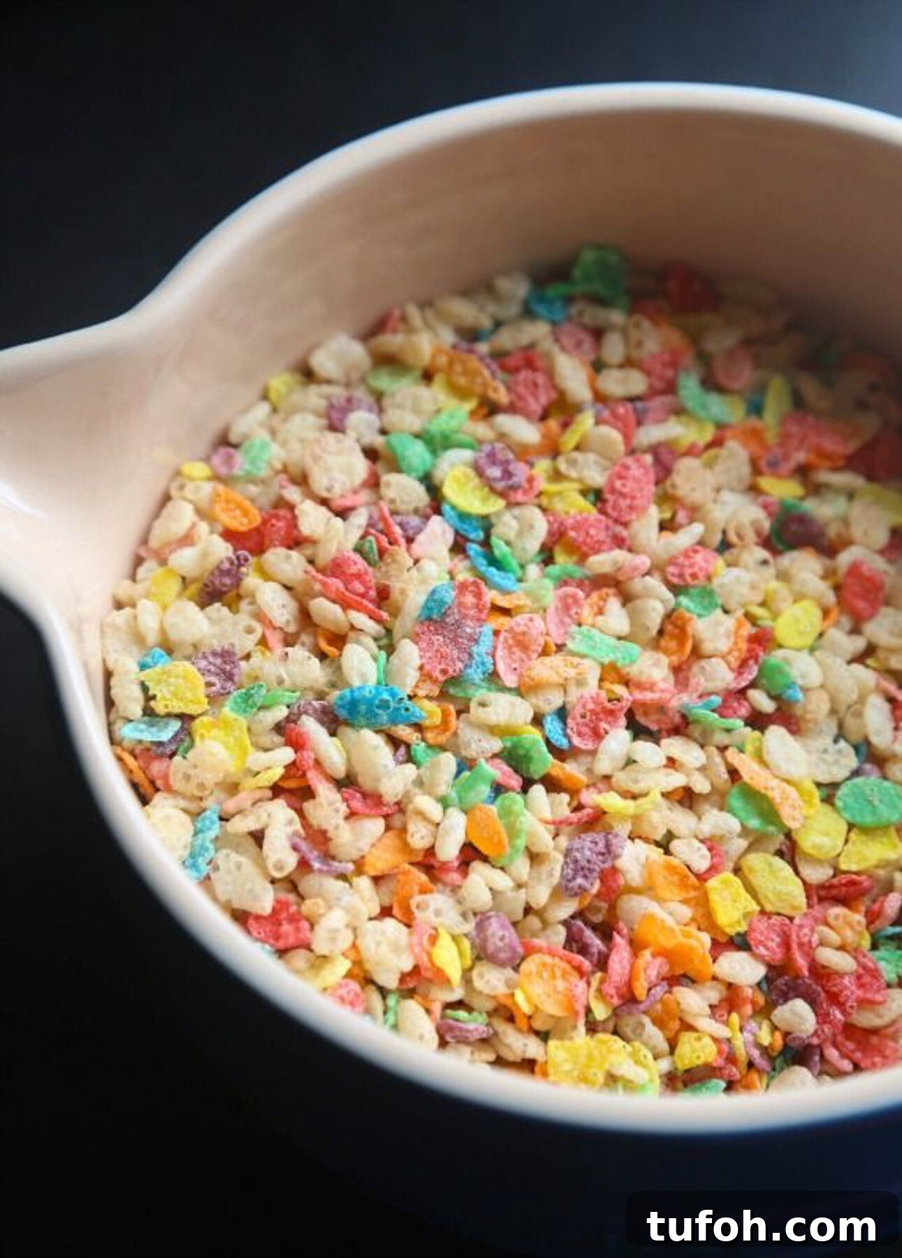 Fruity pebbles in a bowl for Marshmallow Fluff Krispie Treats