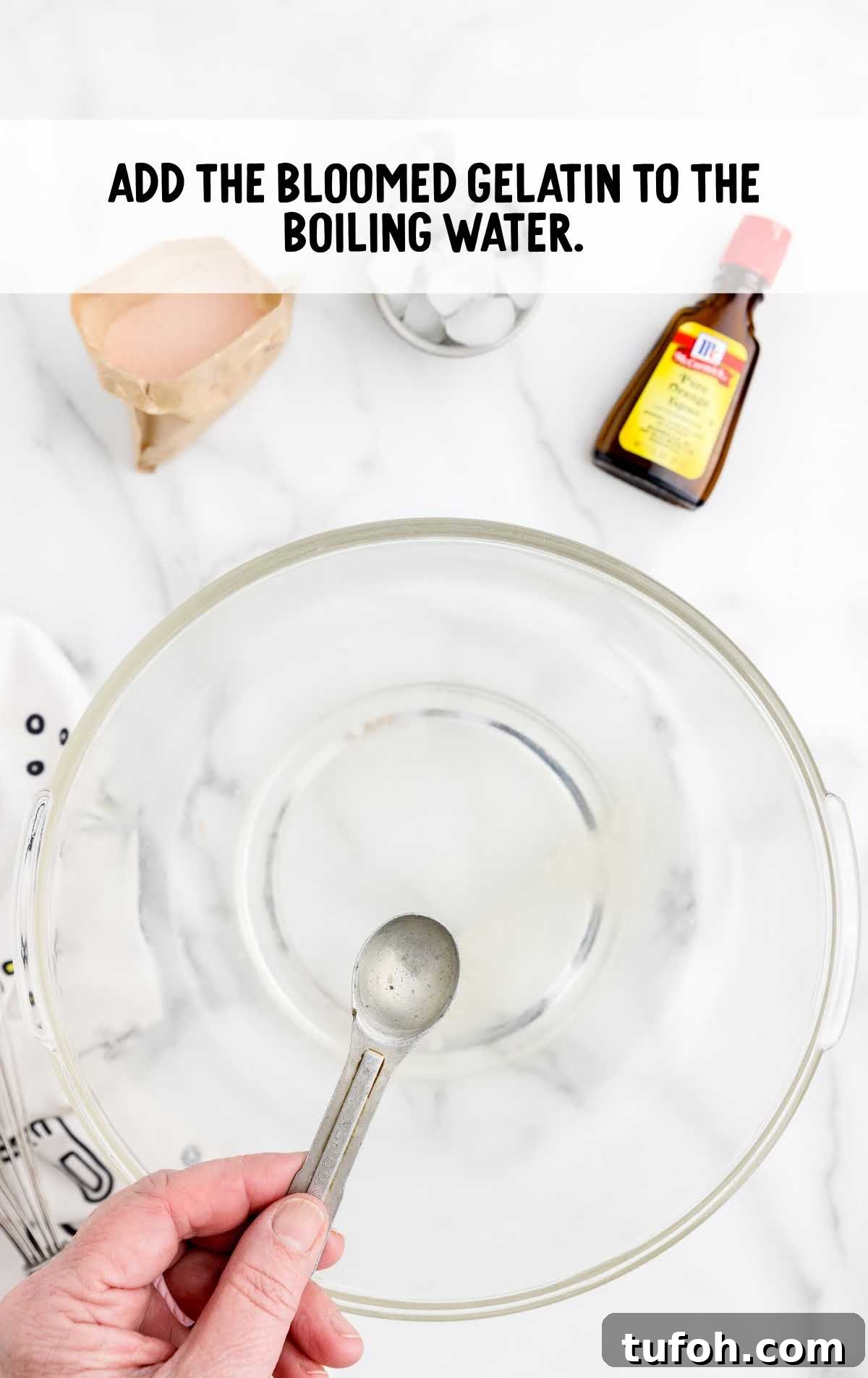 bloomed gelatin added to the bowl of boiling water