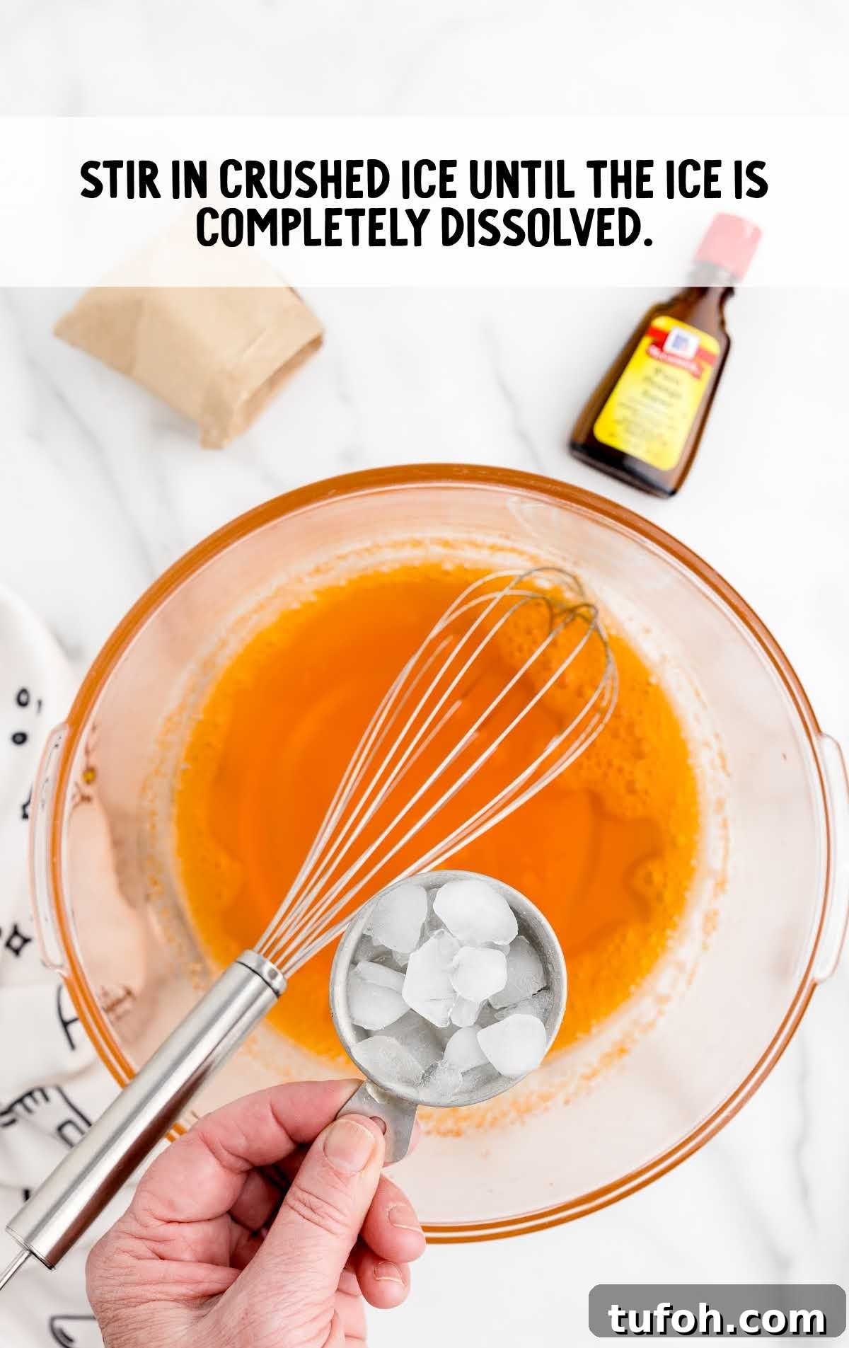 crushed ice added to the bowl of ingredients