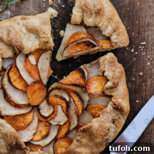 top view of potato galette with one slice cut and pulled out