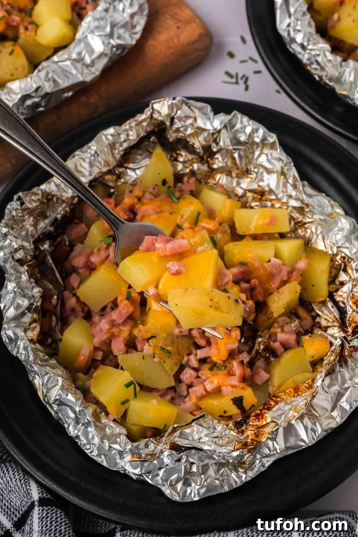 Diced potatoes and and ham with foil packets