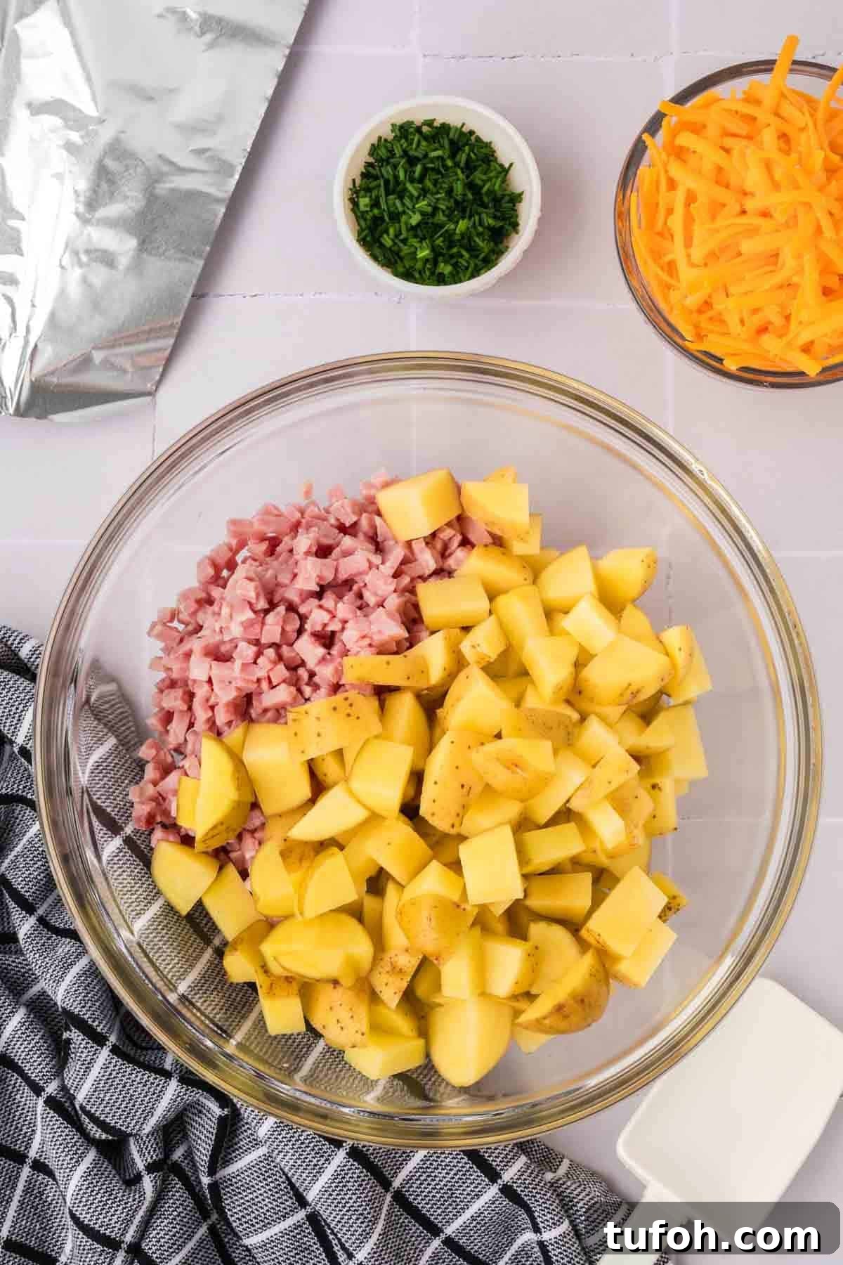 Diced potatoes and ham in a bowl