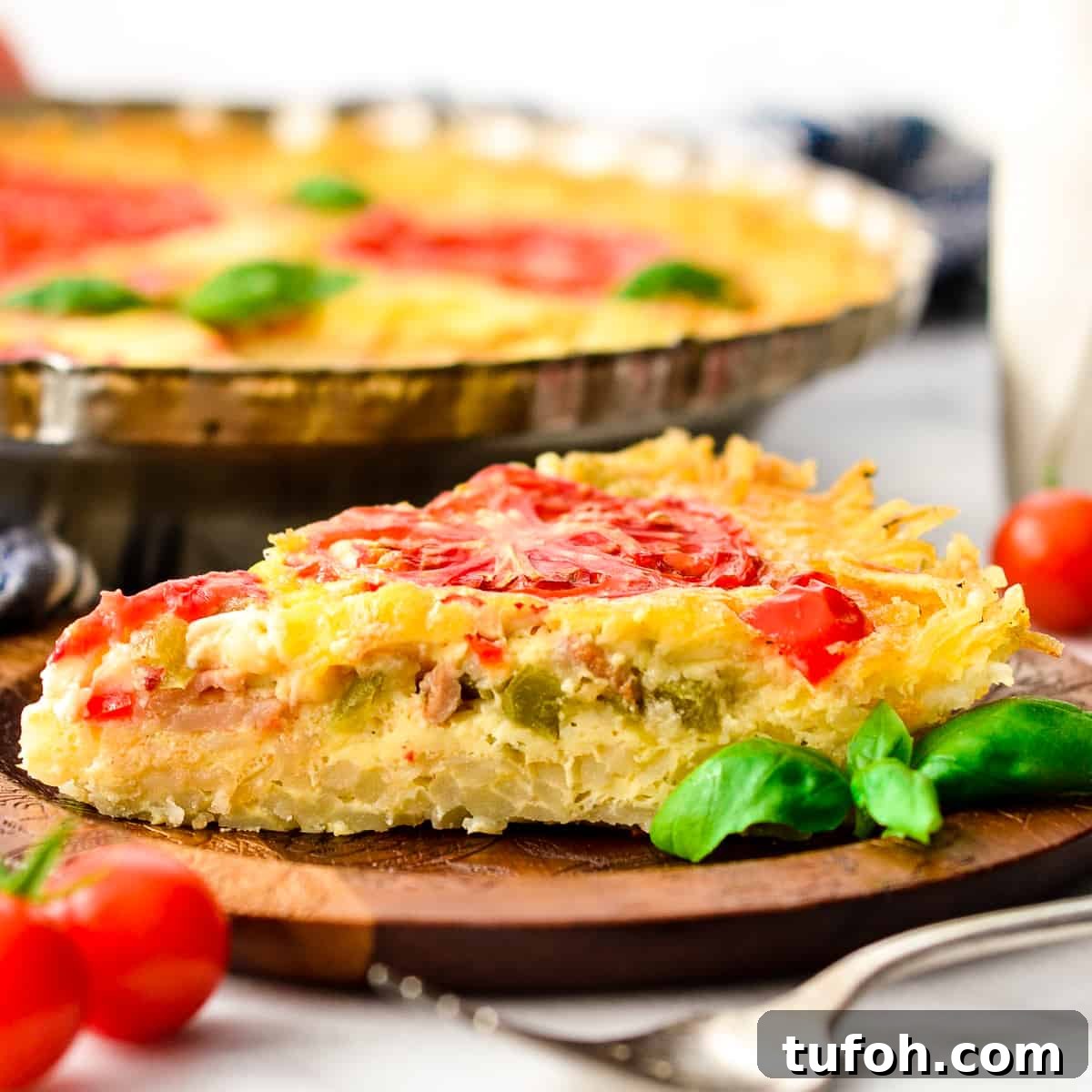 Side view of a one piece of Gluten-Free Hash Brown Quiche 